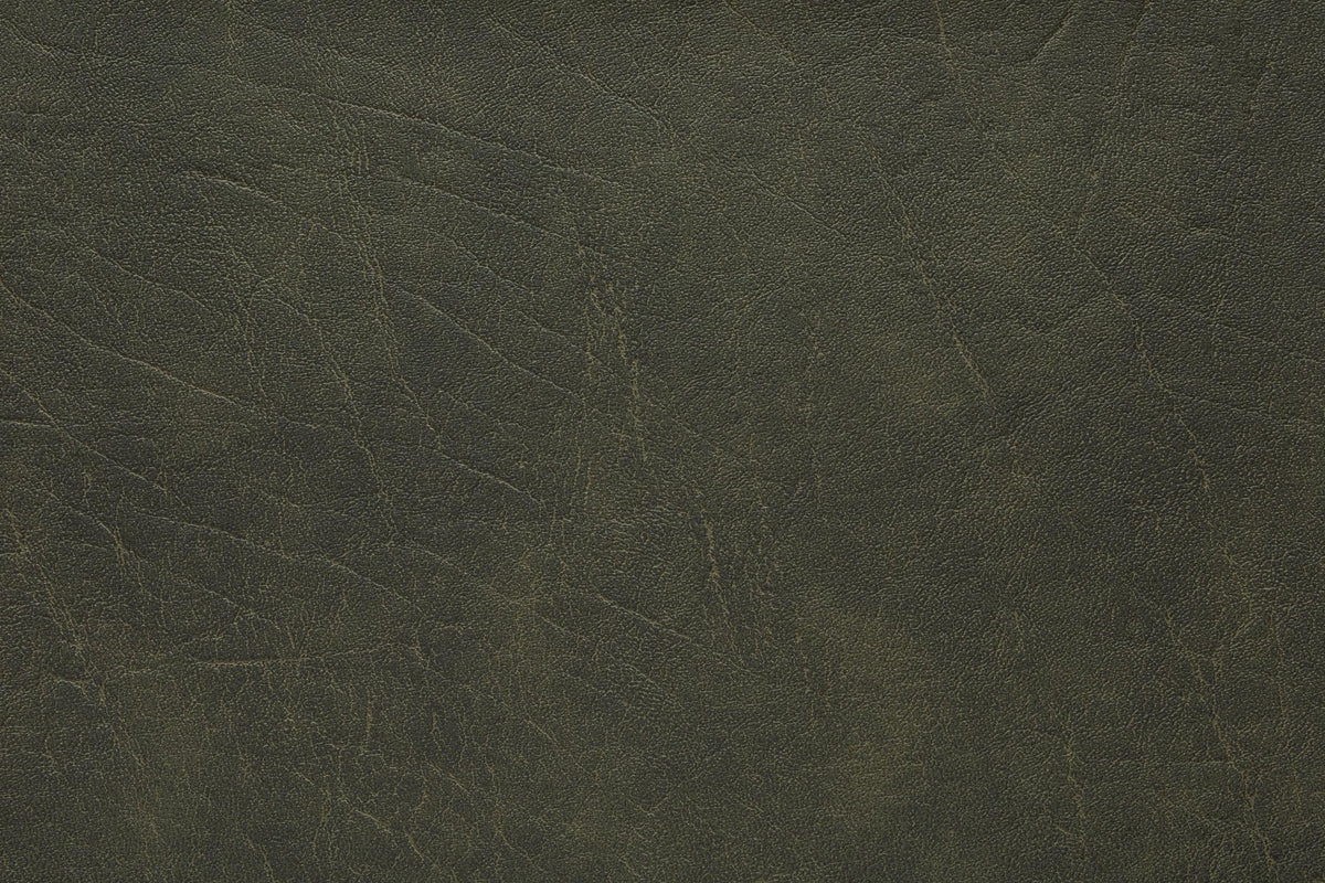 Faded Green Faux Leather Cantilever Chair