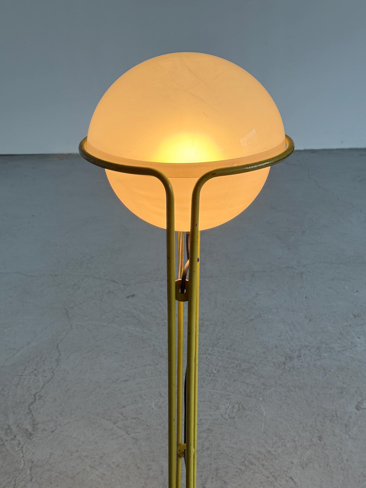 Globe Floor Lamp with Tubular Yellow Metal