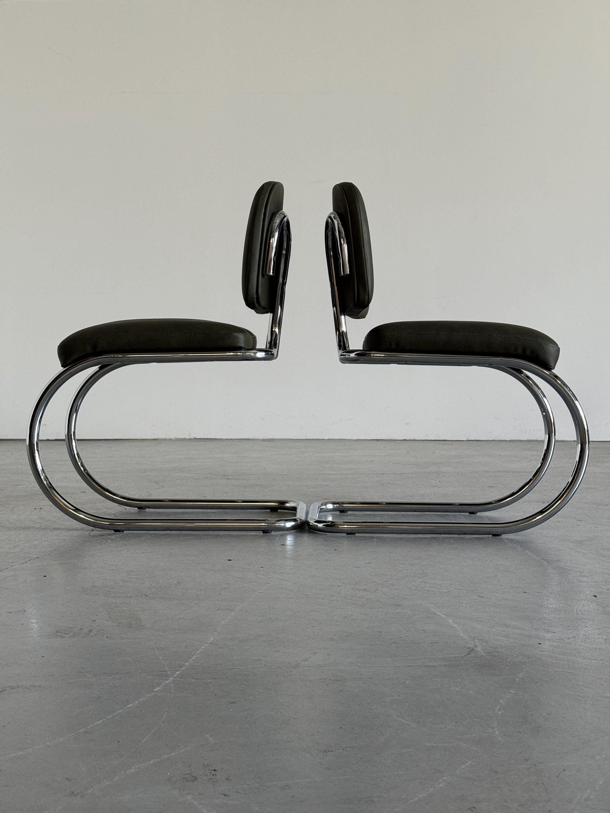 Faded Green Faux Leather Cantilever Chair