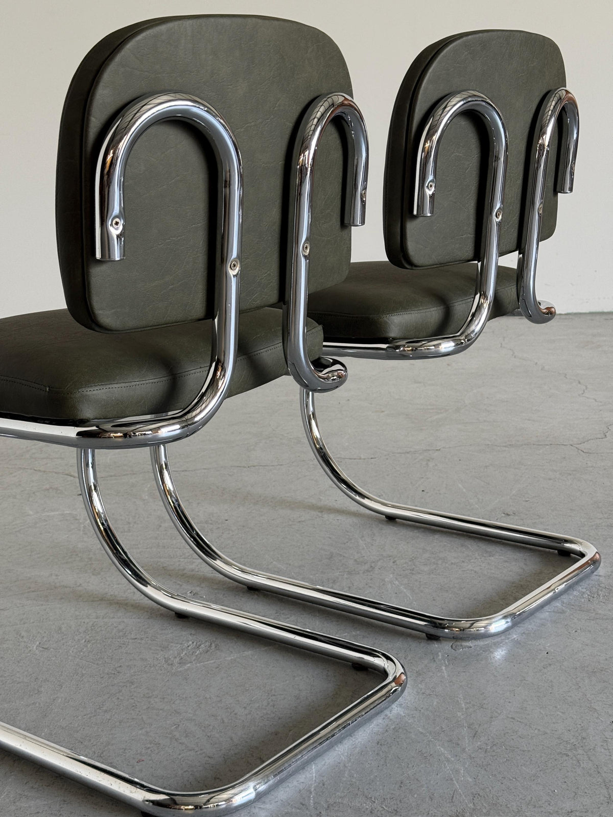 Faded Green Faux Leather Cantilever Chair