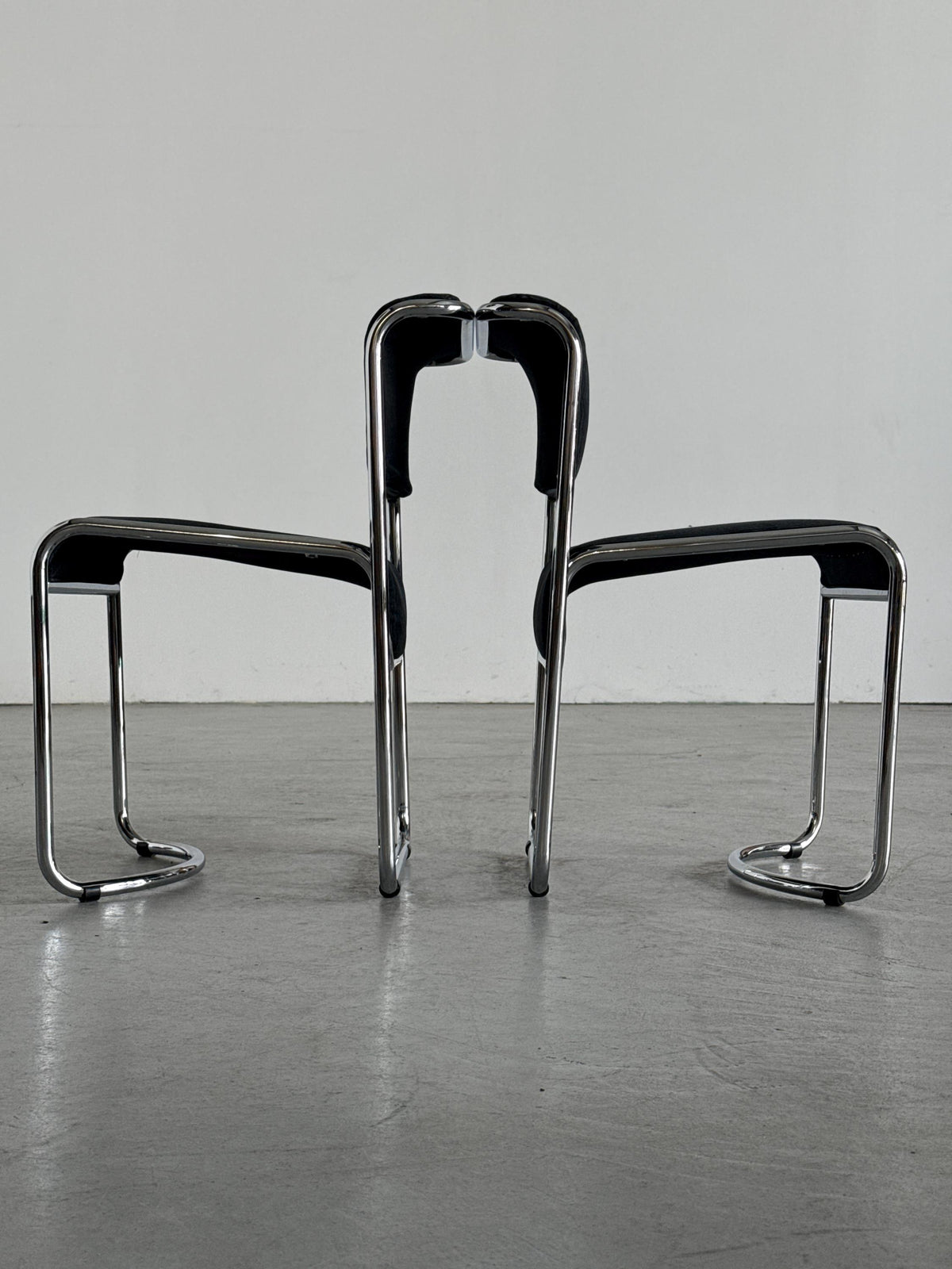 Modernist Black Ribbed and Tubular Chrome Chairs