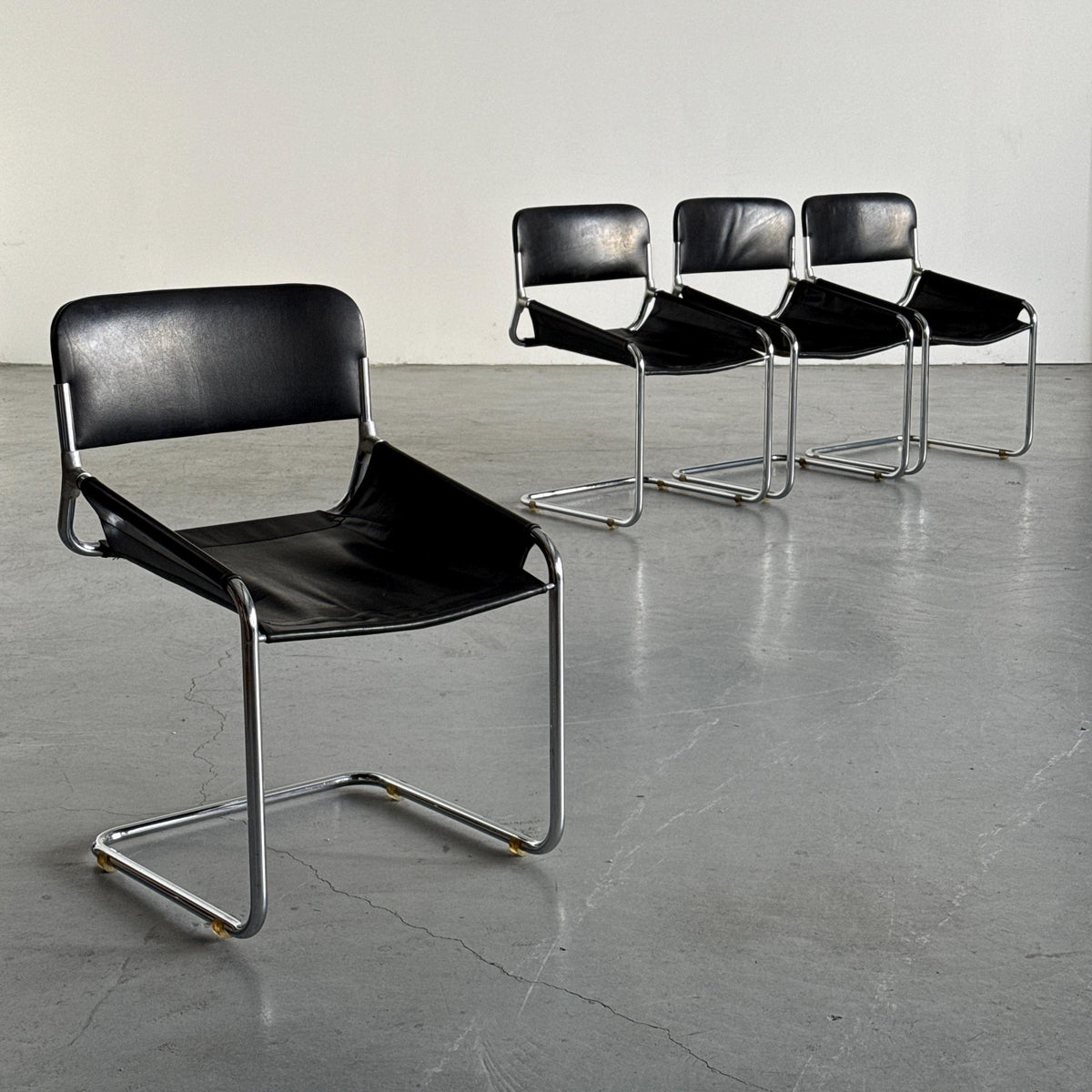Black Leather & Chrome Cantilever Dining Chairs