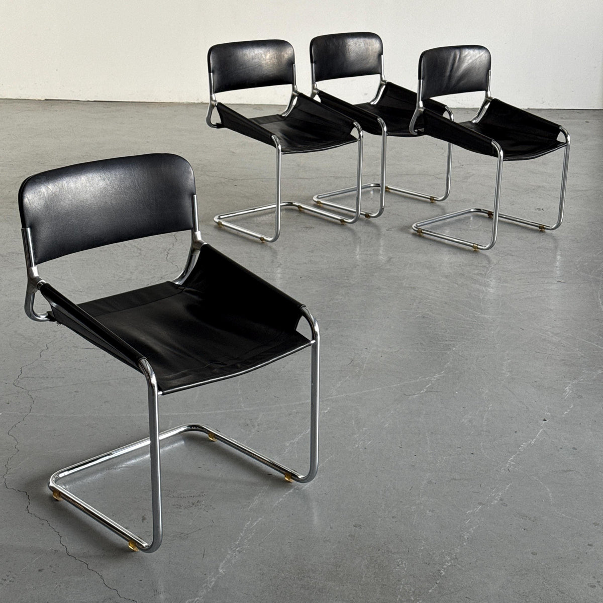 Black Leather & Chrome Cantilever Dining Chairs