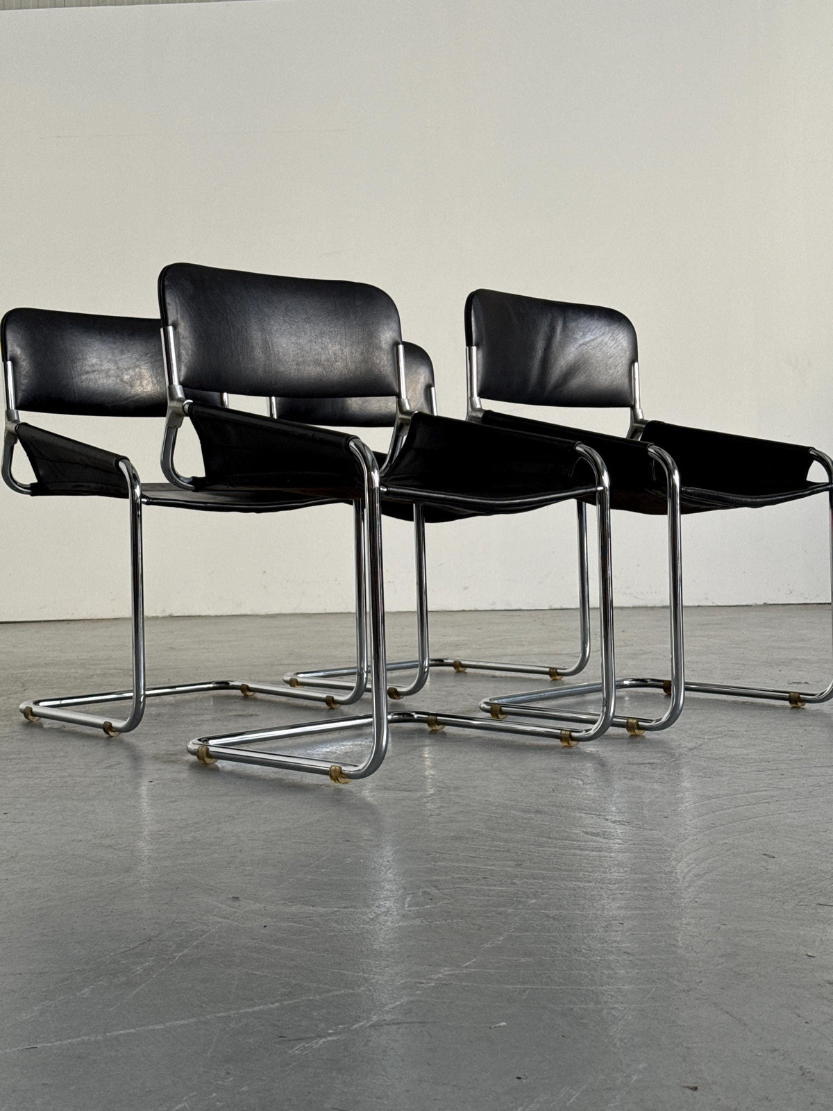 Black Leather & Chrome Cantilever Dining Chairs