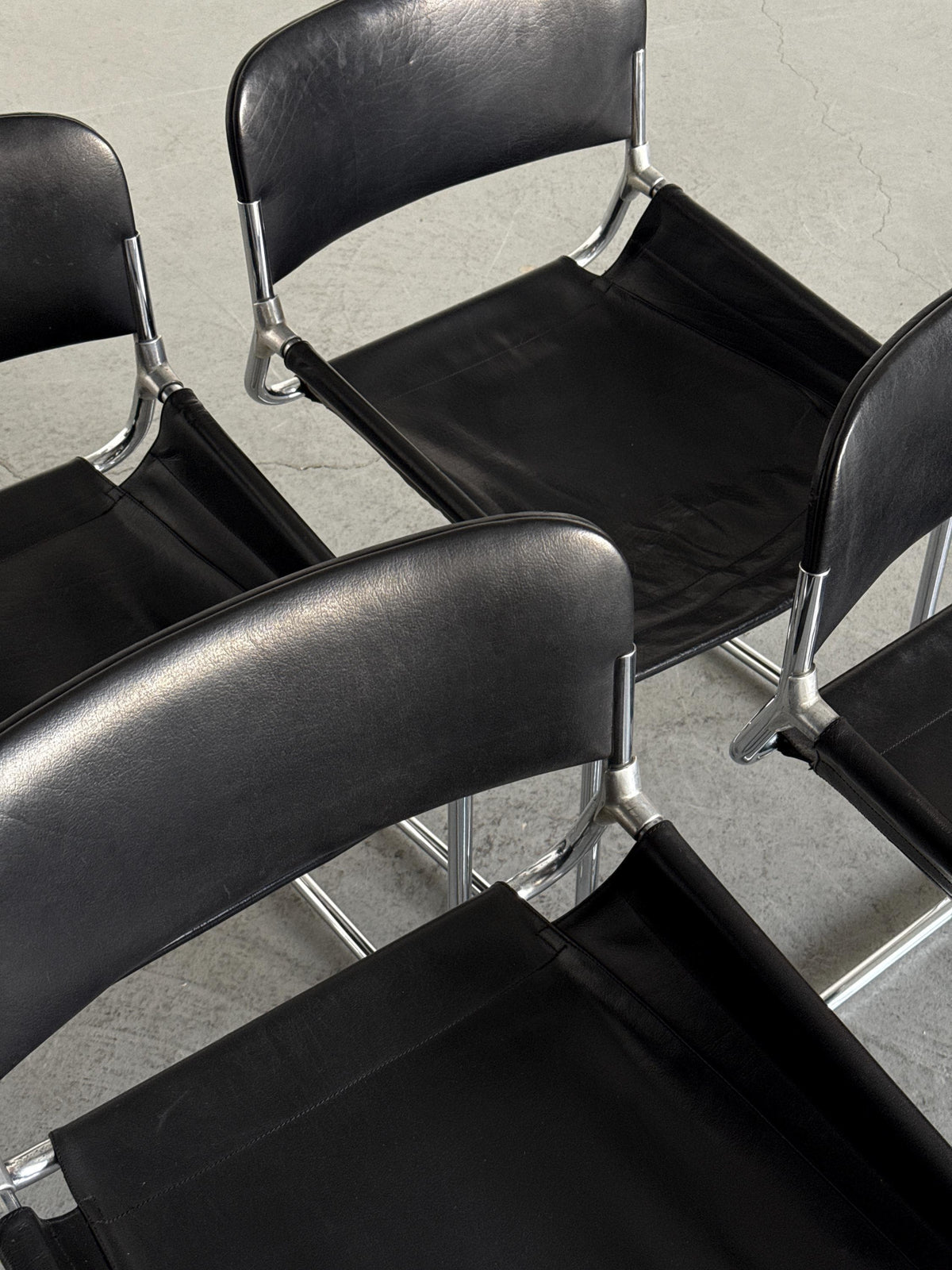 Black Leather & Chrome Cantilever Dining Chairs