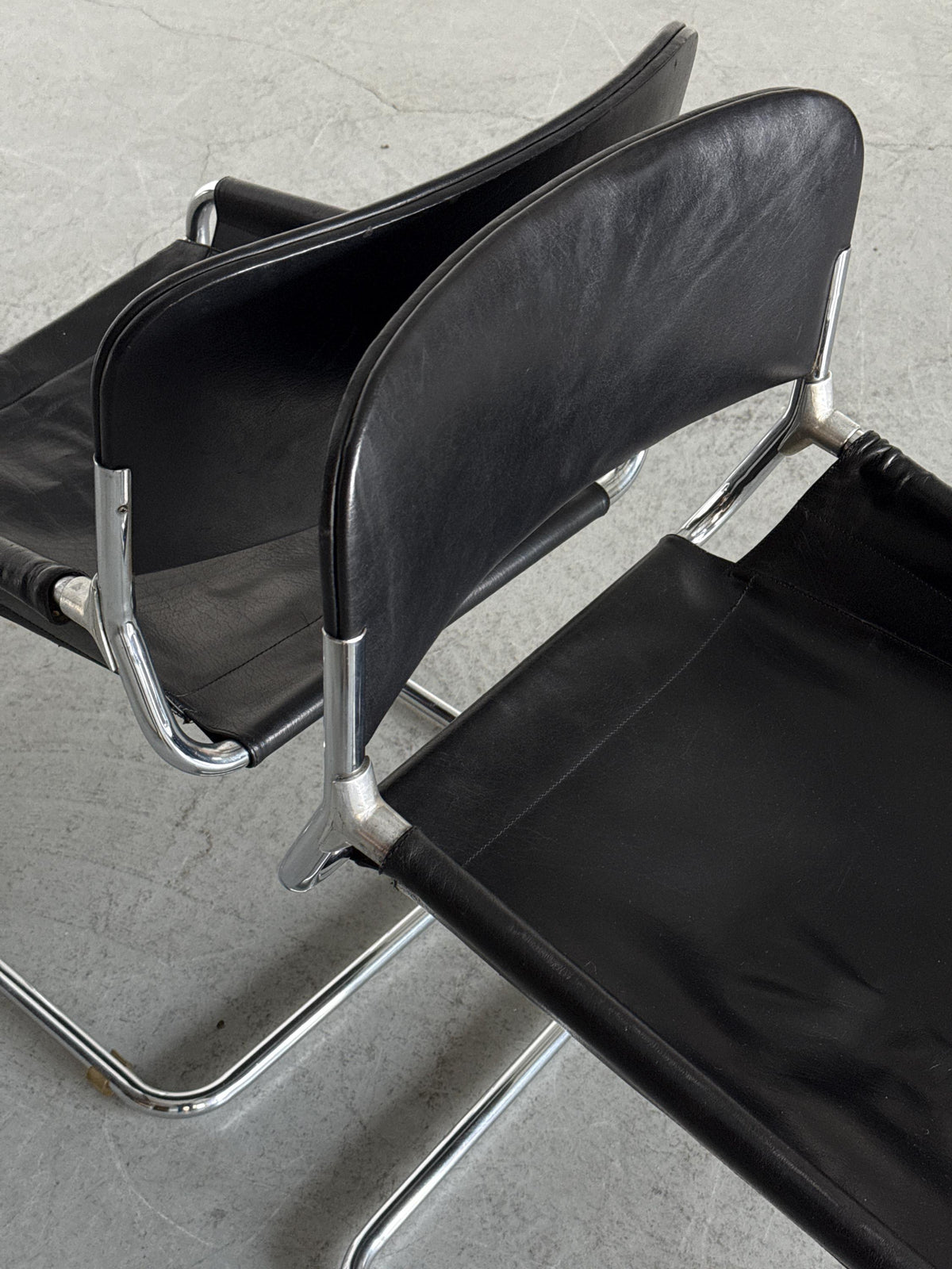 Black Leather & Chrome Cantilever Dining Chairs