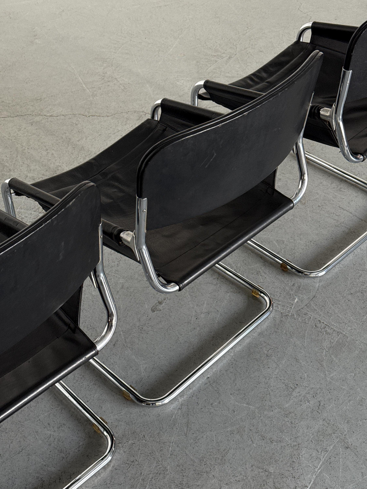 Black Leather & Chrome Cantilever Dining Chairs