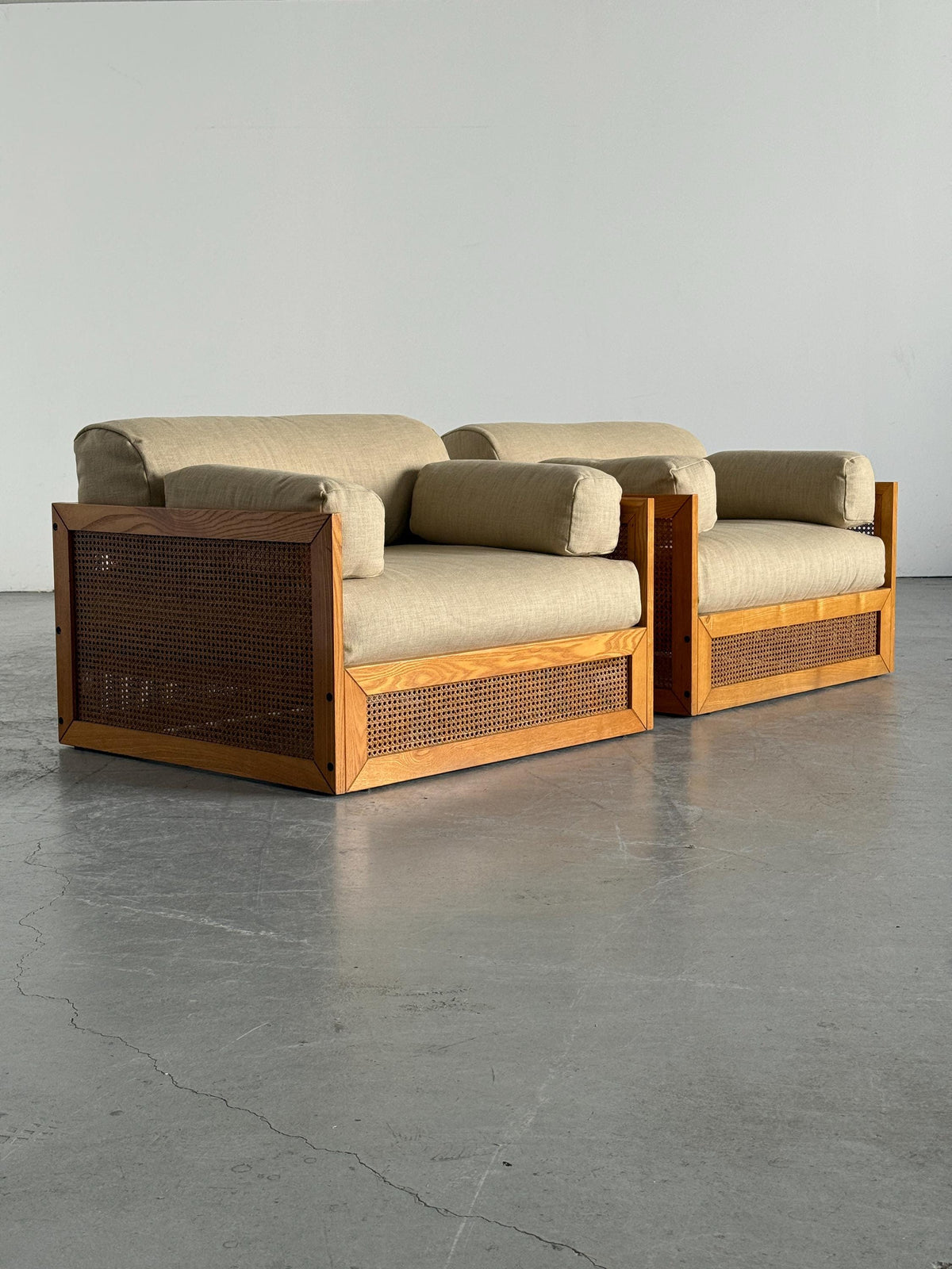 Woven Cane Armchairs in Warm Ivory Linen