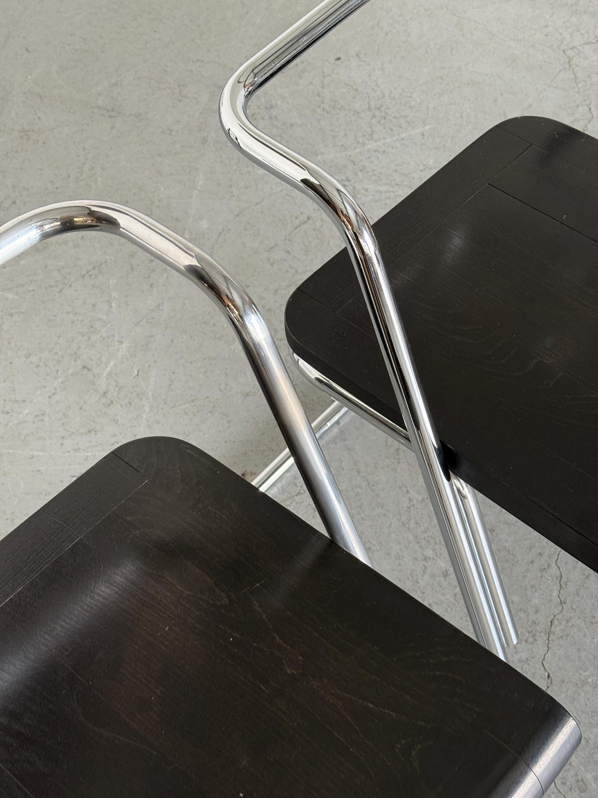 Minimalist Black Wood Cantilever Chairs