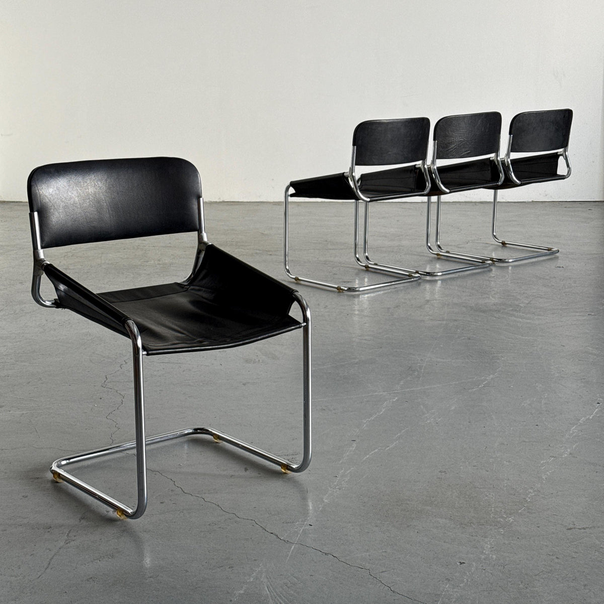 Black Leather & Chrome Cantilever Dining Chairs