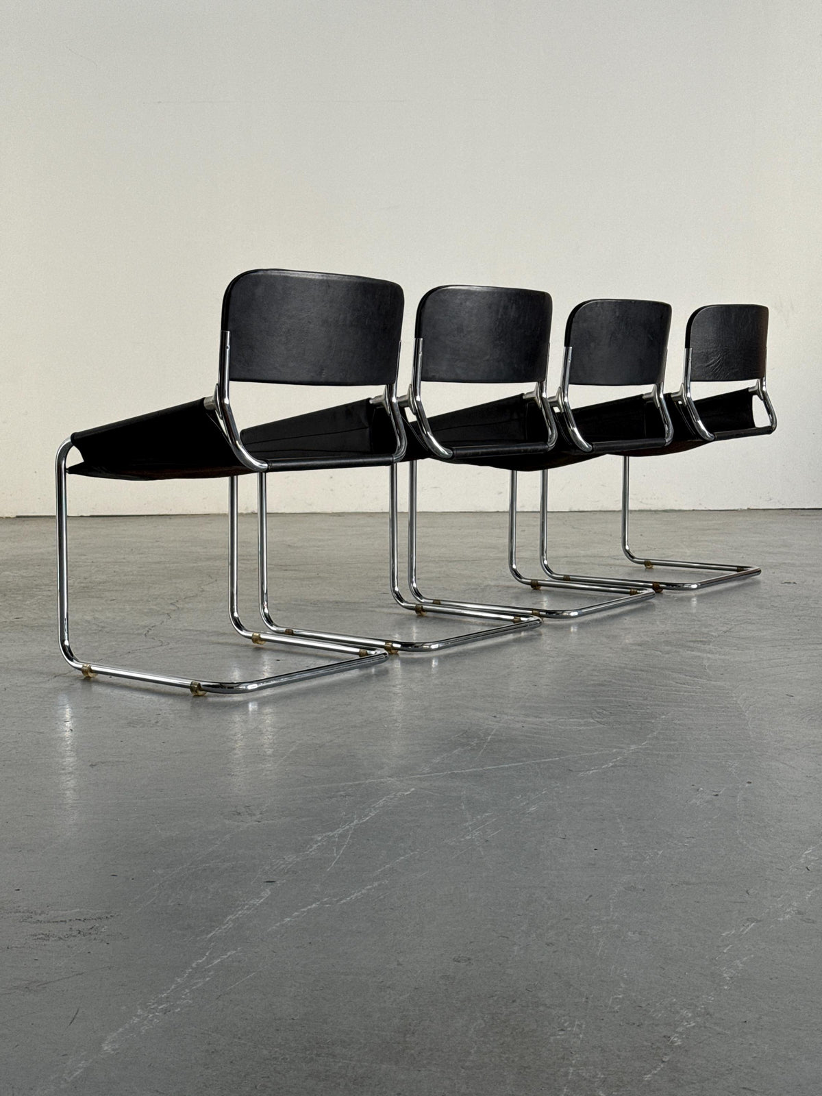 Black Leather & Chrome Cantilever Dining Chairs