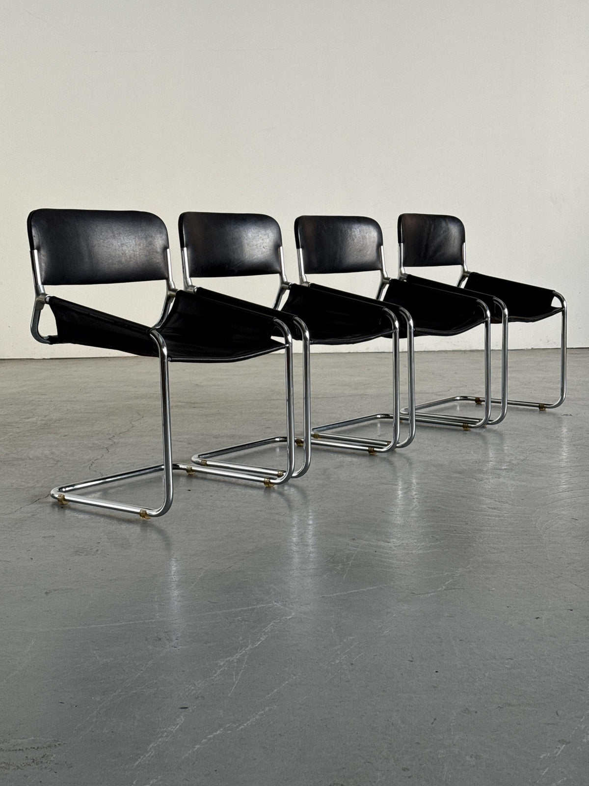 Black Leather & Chrome Cantilever Dining Chairs