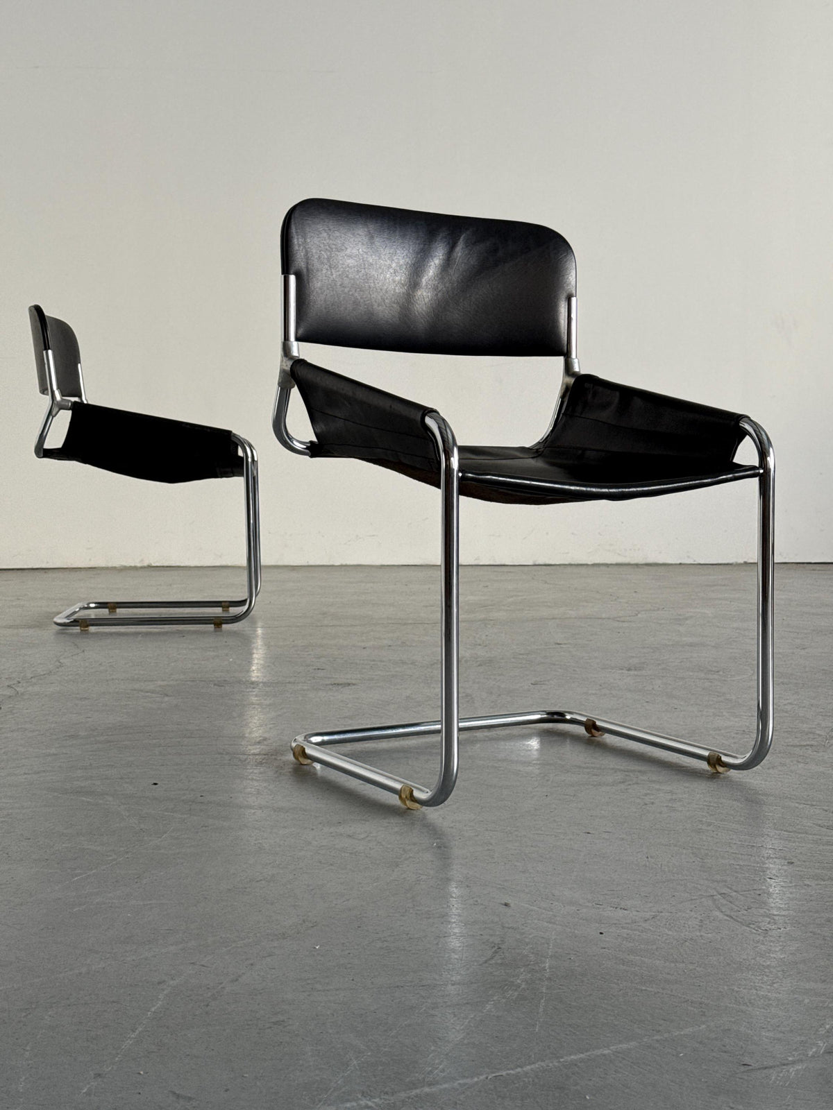 Black Leather & Chrome Cantilever Dining Chairs