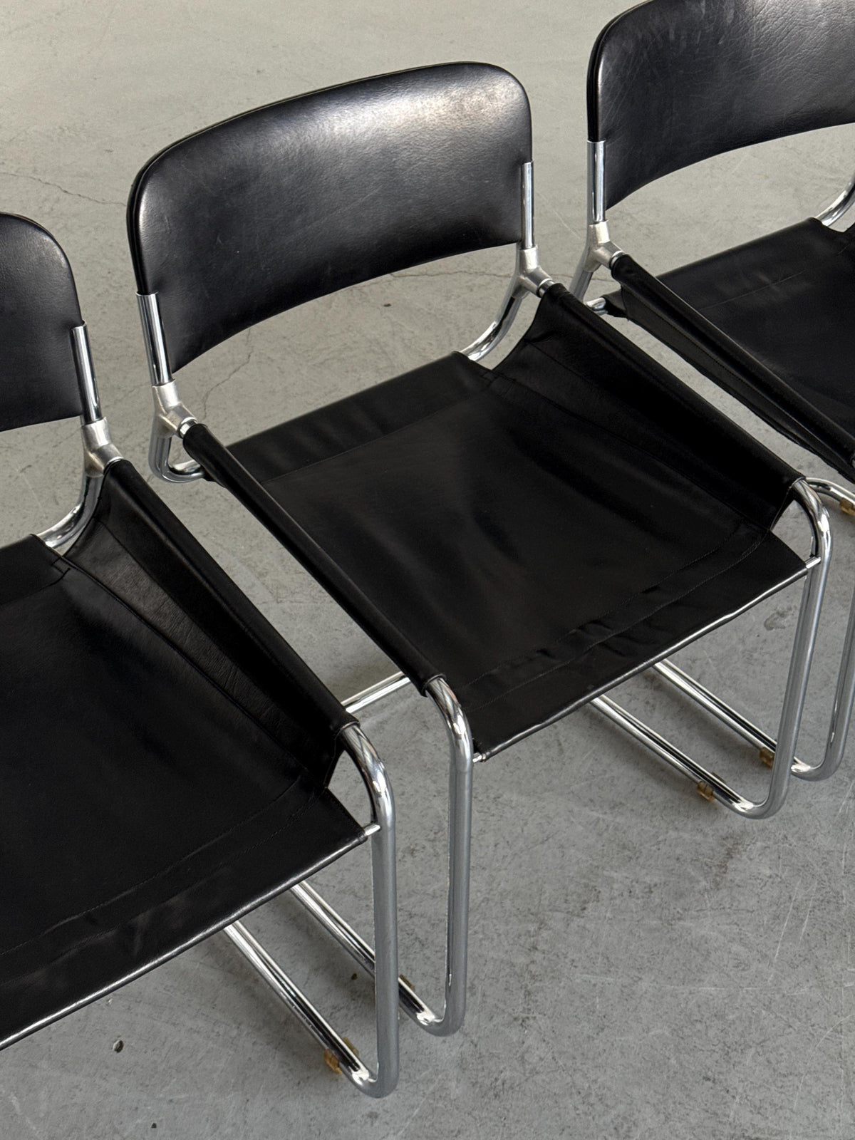 Black Leather & Chrome Cantilever Dining Chairs